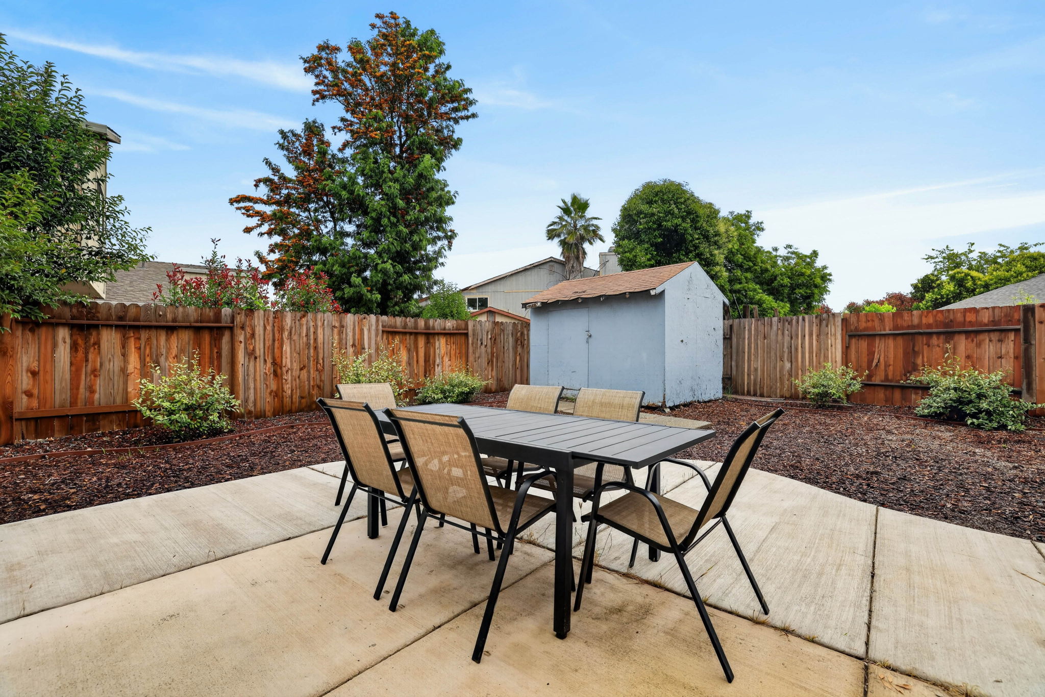 Private backyard with outdoor dining