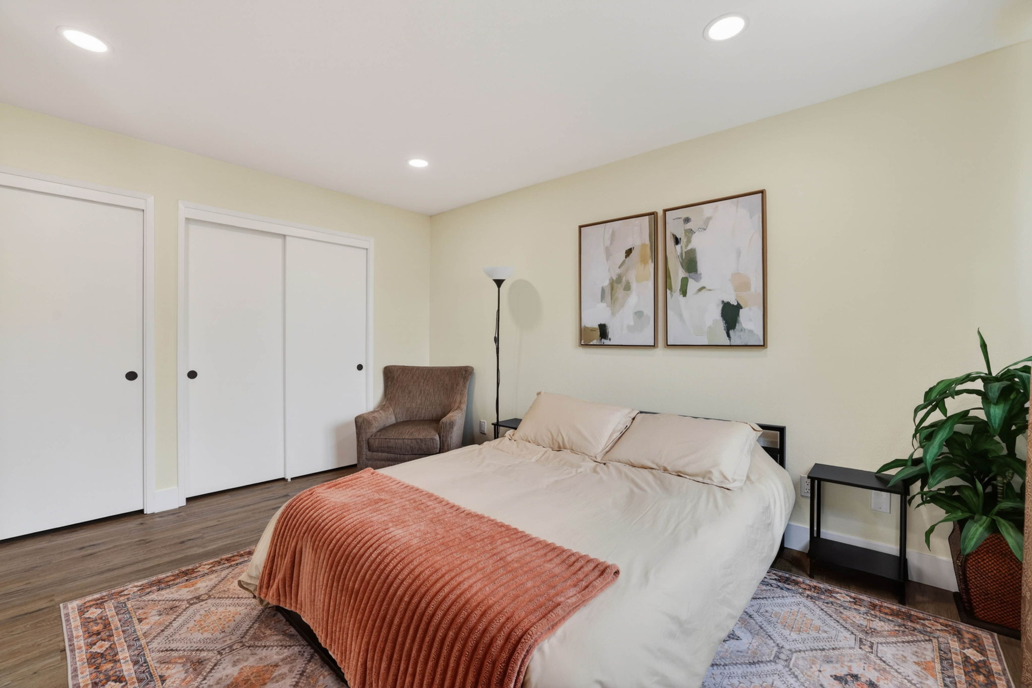 Queen bed with linen bedding