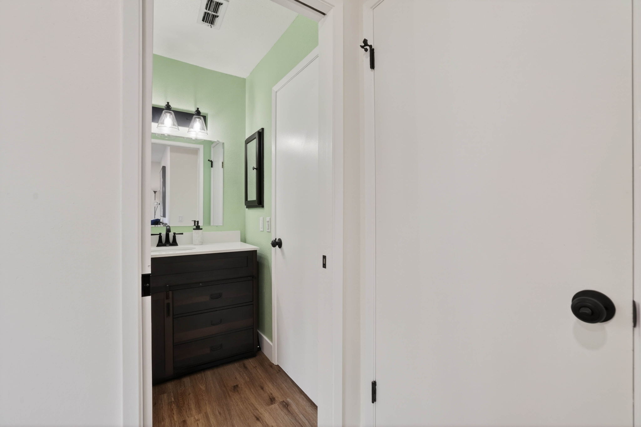 Bedroom 3 and bathroom entry