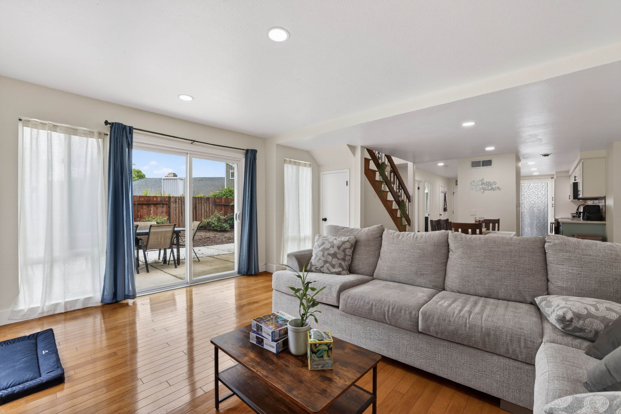 Open living room with backyard view